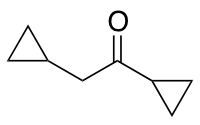 1,2-Dicyclopropylethan-1-one